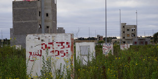 A field with many plots of land for sale